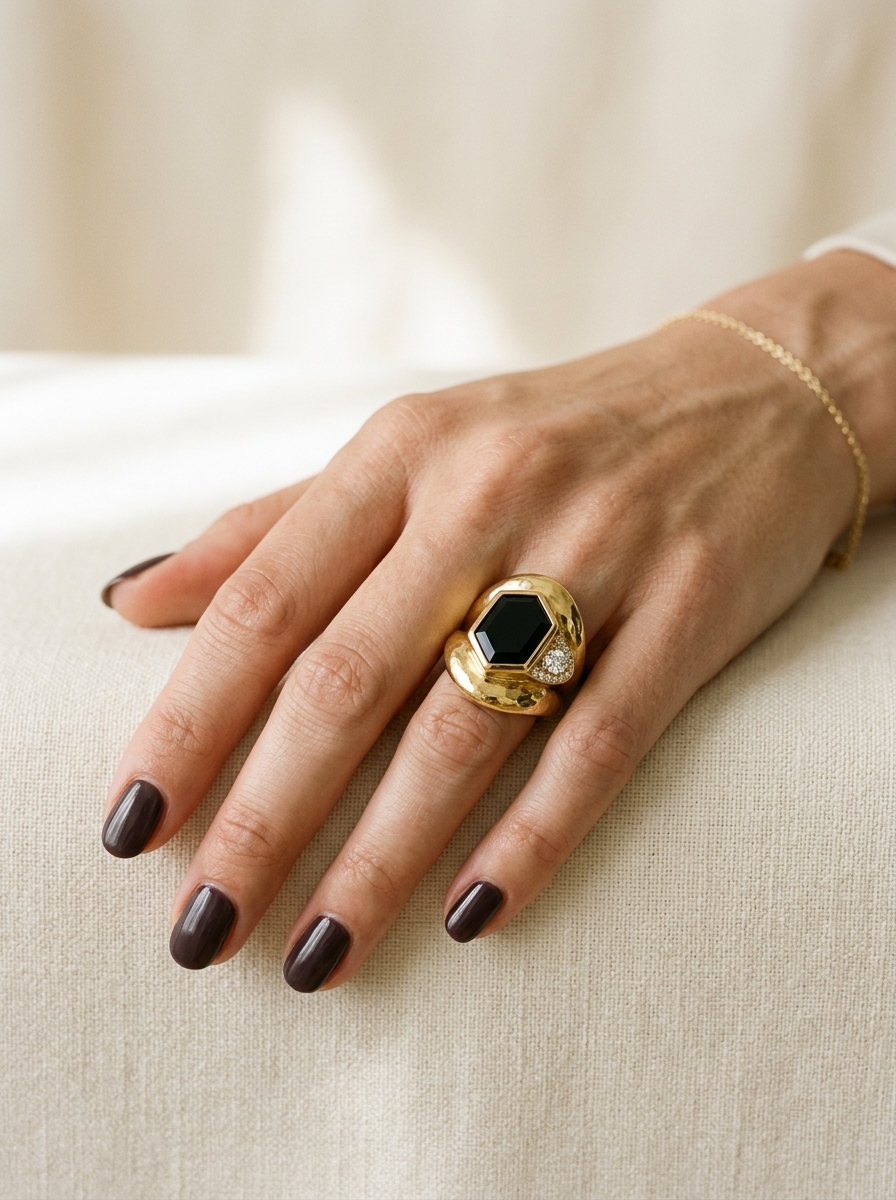 Model hand wearing fine statement diamond ring